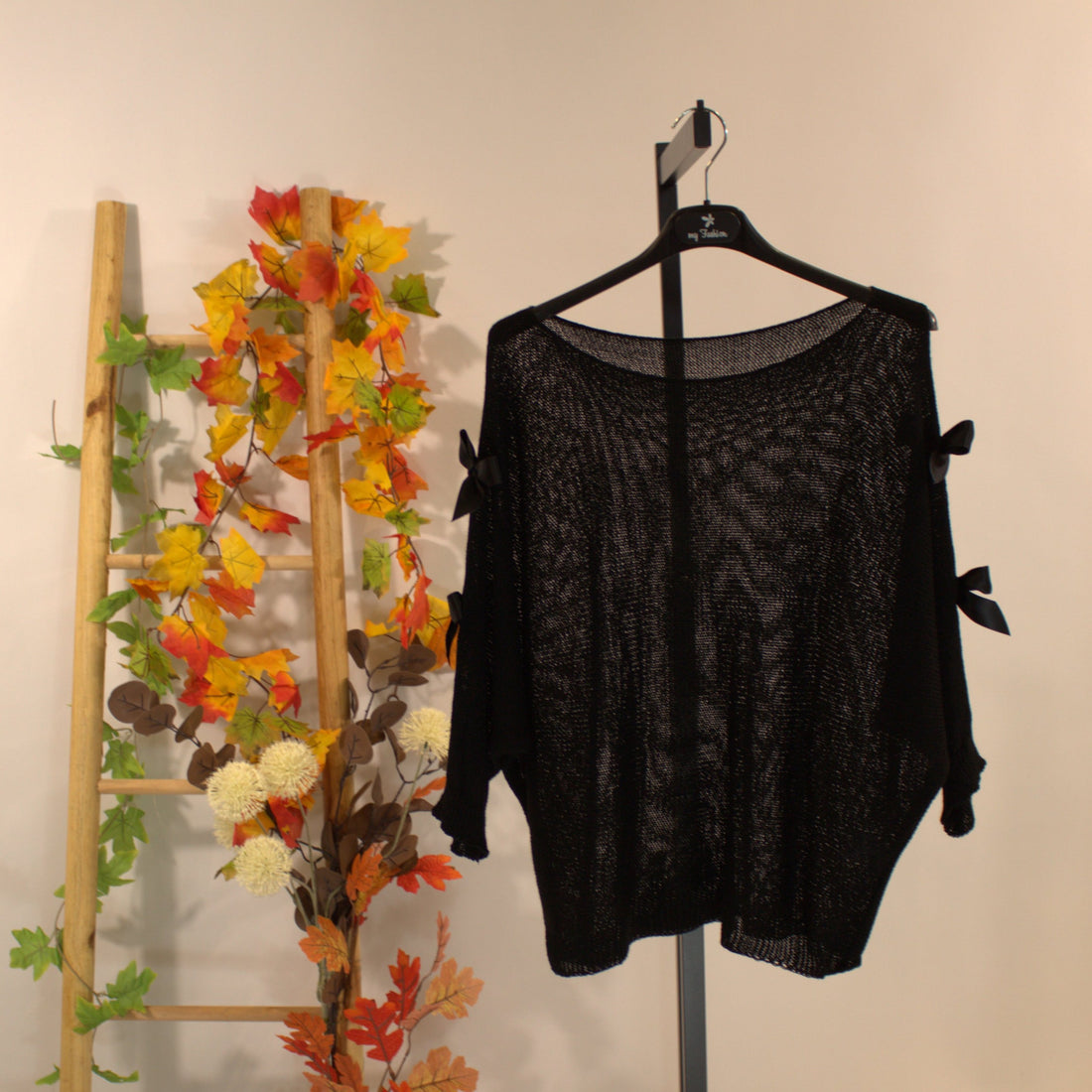 Stricktop mit Schleifchen - Schwarz